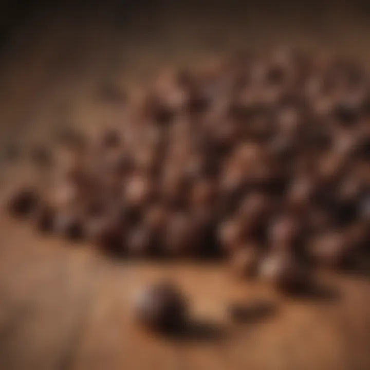 Close-up of whole cloves on a wooden surface