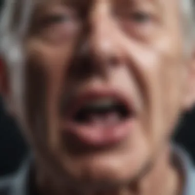 Close-up of elderly man experiencing involuntary tongue movements