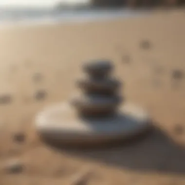 Zen stones balanced on sand